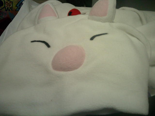 Hood of a Final Fantasy moogle onesie.